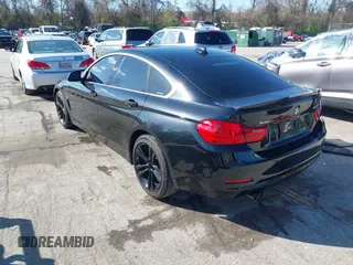 2016 BMW 4 Series 428i xDrive with VIN WBA4C9C53GG135945, listed as a IAAI auction lot 41964691 with 93,273 mi miles and . Bid and sale history available at carsss.com. Image 3.