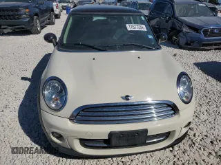 2013 MINI Hardtop with VIN WMWSU3C56DT682857, listed as a Copart auction lot 77677234 with 92,625 mi miles and Clean Title. Bid and sale history available at DreamBid. Image 5.