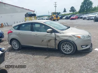 2015 Ford Focus Titanium с VIN 1FADP3N2XFL367753, выставлен на аукционе IAAI как лот 42695722 с пробегом 26 565 миль миль и . История ставок и продаж доступна на DreamBid. Изображение 13.