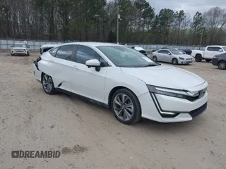 2018 Honda Clarity Plug-In Hybrid Touring with VIN JHMZC5F38JC001442, listed as a IAAI auction lot 41848328 with 99,156 mi miles. Bid and sale history available at carsss.com. Image 1.