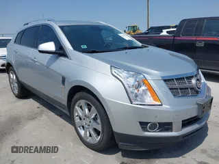 2011 Cadillac SRX Premium Collection z VIN 3GYFNCEY2BS594415, wystawiony jako IAAI lot #42042854 z przebiegiem 130 894 mil mil oraz . Historia ofert i sprzedaży dostępna na DreamBid. Obrazek 1.