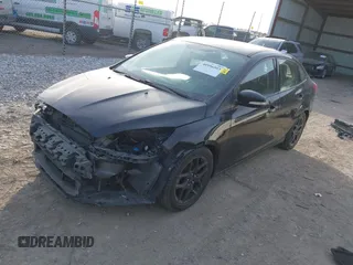 2016 Ford Focus SE z VIN 1FADP3FEXGL310270, wystawiony jako IAAI lot #40956503 z przebiegiem 156 812 mil mil oraz . Historia ofert i sprzedaży dostępna na DreamBid. Obrazek 2.