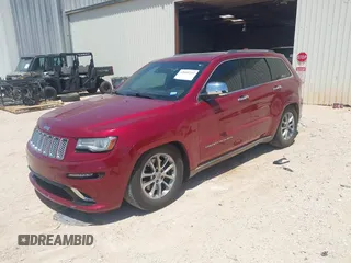 2014 Jeep Grand Cherokee Summit with VIN 1C4RJFJT1EC237358, listed as a IAAI auction lot 42602245 with 106,821 mi miles and . Bid and sale history available at DreamBid. Image 17.