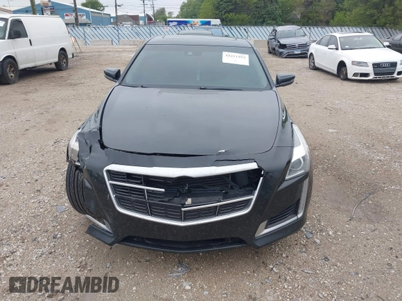 2014 Cadillac CTS Luxury AWD with VIN 1G6AX5SX9E0197395, listed as a IAAI auction lot 42211452 with 90,657 mi miles and . Bid and sale history available at DreamBid. Image 12.