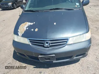 2003 Honda Odyssey EX with VIN 5FNRL18683B132703, listed as a IAAI auction lot 42004982 with Not Provided miles and . Bid and sale history available at DreamBid. Image 6.
