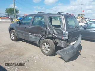 2002 Ford Escape XLS Value with VIN 1FMYU01B32KD20469, listed as a IAAI auction lot 42553573 with 353,752 mi miles and . Bid and sale history available at DreamBid. Image 3.