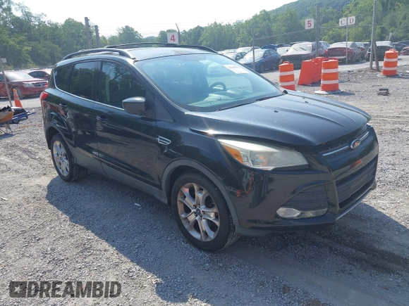 2013 Ford Escape SE z VIN 1FMCU9GX5DUA19887, wystawiony jako IAAI lot #42580986 z przebiegiem 169 407 mil mil oraz . Historia ofert i sprzedaży dostępna na DreamBid. Obrazek 1.