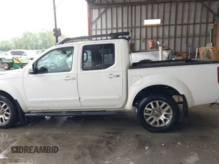 2011 Nissan Frontier Pro-4X with VIN 1N6AD0EV3BC409184, listed as a IAAI auction lot 42122823 with 209,669 mi miles and . Bid and sale history available at DreamBid. Image 14.