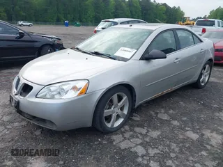2006 Pontiac G6 GTP z VIN 1G2ZM551864235844, wystawiony jako IAAI lot #42088507 z przebiegiem 170 376 mil mil oraz . Historia ofert i sprzedaży dostępna na DreamBid. Obrazek 2.