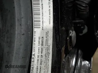 2017 Maserati Ghibli S Q4 z VIN ZAM57RTA0H1196498, wystawiony jako Copart lot #79911364 z przebiegiem 69 950 mil mil oraz Szkody całkowita. Historia ofert i sprzedaży dostępna na DreamBid. Obrazek 14.