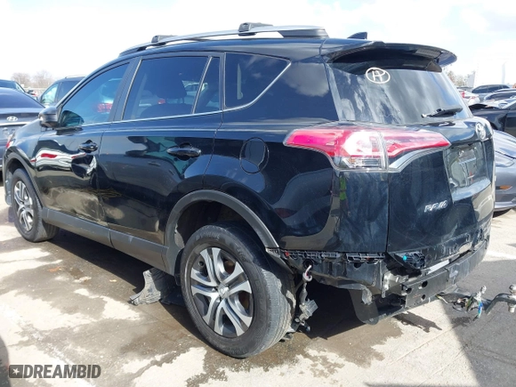 2018 Toyota RAV4 LE with VIN 2T3ZFREV9JW457062, listed as a IAAI auction lot 41696609 with 96,716 mi miles. Bid and sale history available at carsss.com. Image 3.