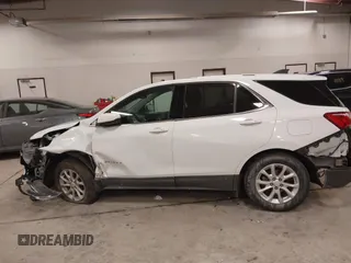2018 Chevrolet Equinox LT z VIN 2GNAXSEV7J6138909, wystawiony jako IAAI lot #41295974 z przebiegiem 68 852 mil mil oraz . Historia ofert i sprzedaży dostępna na DreamBid. Obrazek 14.