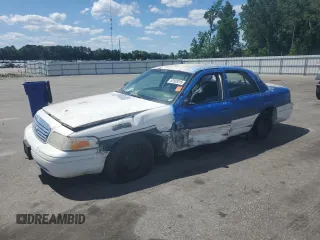 2002 Ford Police Interceptor Street Appear with VIN 2FAFP71WX2X132050, listed as a Copart auction lot 57823015 with 152,391 mi miles and Salvage title. Bid and sale history available at DreamBid. Image 1.