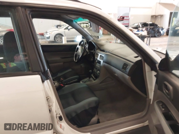 2003 Subaru Forester X with VIN JF1SG63653H762212, listed as a IAAI auction lot 41841892 with 152,059 mi miles. Bid and sale history available at carsss.com. Image 5.