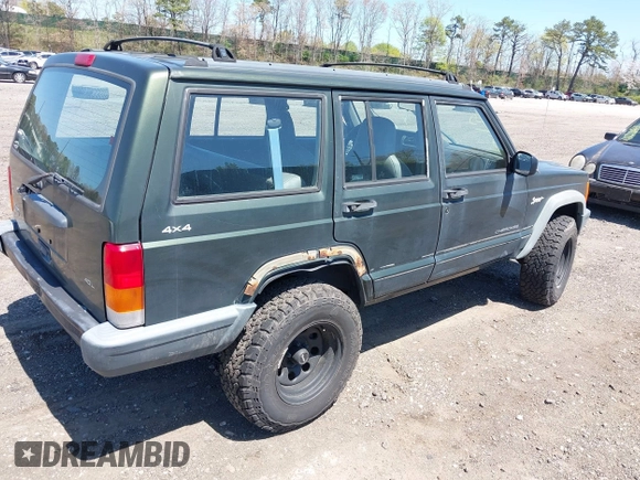 1998 Jeep Cherokee Sport with VIN 1J4FJ68S9WL189992, listed as a IAAI auction lot 42039822 with 156,006 mi miles. Bid and sale history available at carsss.com. Image 4.