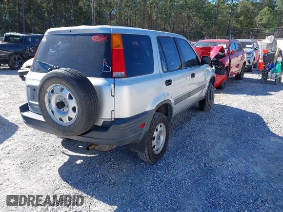 1999 Honda CR-V LX with VIN JHLRD1841XC027566, listed as a IAAI auction lot 41838889 with 213,139 mi miles. Bid and sale history available at carsss.com. Image 4.