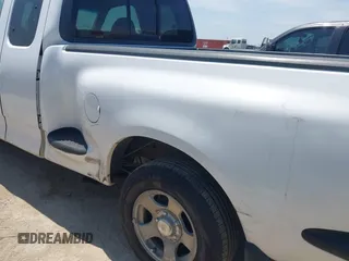 1999 Ford F-150 with VIN 1FTRX07W0XKA01385, listed as a IAAI auction lot 42247809 with 147,105 mi miles and . Bid and sale history available at DreamBid. Image 6.