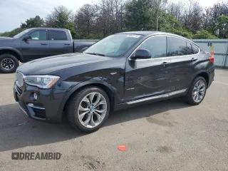 2018 BMW X4 xDrive28i with VIN 5UXXW3C56J0Z60753, listed as a Copart auction lot 60642114 with 34,074 mi miles and Salvage Title. Bid and sale history available at carsss.com. Image 1.