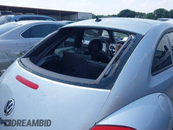 2013 Volkswagen Beetle 2.5L with VIN 3VWJX7AT7DM673319, listed as a IAAI auction lot 42169554 with 128,622 mi miles and . Bid and sale history available at DreamBid. Image 6.