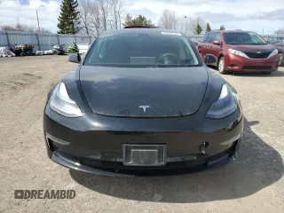 2021 Tesla Model 3 Standard Range Plus with VIN 5YJ3E1EA7MF053663, listed as a Copart auction lot 51982265 with 90,529 mi miles and Salvage Title. Bid and sale history available at DreamBid. Image 5.