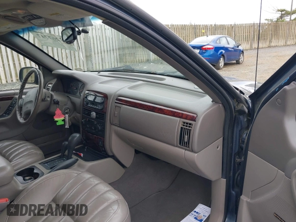 2000 Jeep Grand Cherokee Limited with VIN 1J4GW58N1YC395806, listed as a IAAI auction lot 42267747 with 180,120 mi miles and . Bid and sale history available at DreamBid. Image 5.
