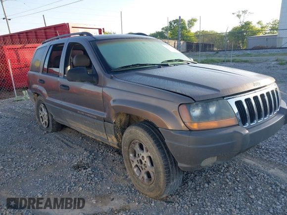 2002 Jeep Grand Cherokee with VIN 1J4GW38N42C202219, listed as a IAAI auction lot 42035162 with 220,012 mi miles and . Bid and sale history available at DreamBid. Image 1.