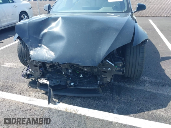 2022 Tesla Model S z VIN 5YJSA1E56NF490064, wystawiony jako IAAI lot #41858477 z przebiegiem Nie podano mil oraz . Historia ofert i sprzedaży dostępna na DreamBid. Obrazek 6.
