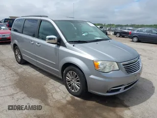 2014 Chrysler Town & Country Touring-L with VIN 2C4RC1CG2ER107917, listed as a IAAI auction lot 42180194 with 169,447 mi miles. Bid and sale history available at carsss.com. Image 1.