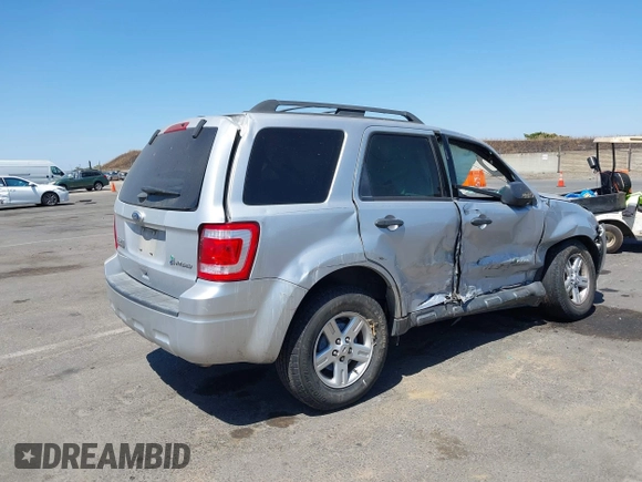 2011 Ford Escape Hybrid with VIN 1FMCU4K33BKB53300, listed as a IAAI auction lot 42561682 with 144,628 mi miles and . Bid and sale history available at DreamBid. Image 4.