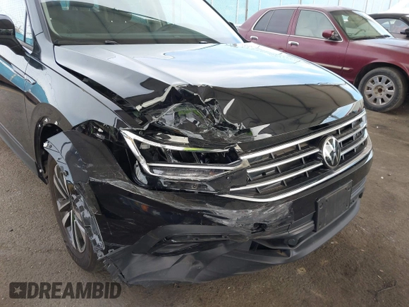 2023 Volkswagen Tiguan S with VIN 3VVRB7AX7PM109974, listed as a IAAI auction lot 41686163 with 42,284 mi miles and . Bid and sale history available at DreamBid. Image 6.