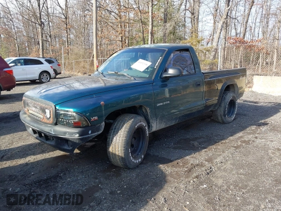 1999 Dodge Dakota SLT with VIN 1B7FL26X0XS208461, listed as a IAAI auction lot 41492338 with 185,400 mi miles. Bid and sale history available at carsss.com. Image 2.
