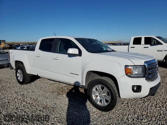 2015 GMC Canyon 4WD SLE with VIN 1GTG6BE32F1185781, listed as a Copart auction lot 79688404 with 199,781 mi miles and Salvage Title. Bid and sale history available at carsss.com. Image 4.