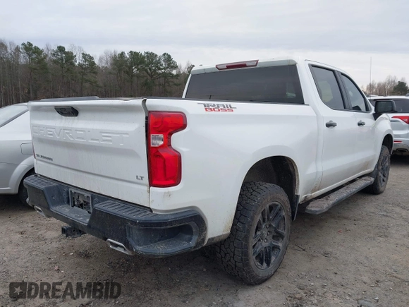 2023 Chevrolet Silverado 1500 LT Trail Boss with VIN 3GCUDFE82PG145067, listed as a IAAI auction lot 41380162 with 34,623 mi miles and . Bid and sale history available at DreamBid. Image 4.