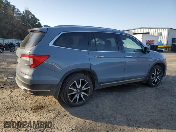 2022 Honda Pilot Touring 7-Passenger with VIN 5FNYF5H69NB031537, listed as a Copart auction lot 48986685 with 88,301 mi miles and Salvage title. Bid and sale history available at DreamBid. Image 3.