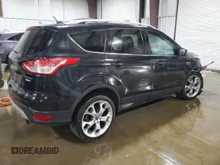 2013 Ford Escape Titanium with VIN 1FMCU9J93DUC84611, listed as a Copart auction lot 59046515 with 126,386 mi miles and Salvage title. Bid and sale history available at DreamBid. Image 3.