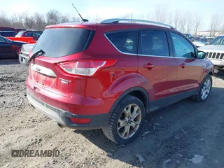2015 Ford Escape Titanium z VIN 1FMCU9J9XFUC75357, wystawiony jako IAAI lot #41705474 z przebiegiem 198 381 mil mil oraz . Historia ofert i sprzedaży dostępna na DreamBid. Obrazek 4.