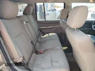 2006 Jeep Commander z VIN 1J8HG48K36C263515, wystawiony jako Copart lot #59080765 z przebiegiem 167 635 mil mil oraz Szkoda całkowita • Salvage title. Historia ofert i sprzedaży dostępna na DreamBid. Obrazek 11.