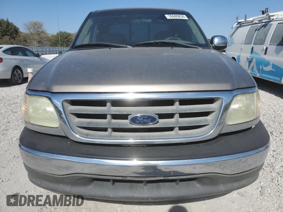 2002 Ford F-150 XLT with VIN 1FTRW07L22KB89313, listed as a Copart auction lot 76680834 with 377,443 mi miles and Salvage Title. Bid and sale history available at DreamBid. Image 5.