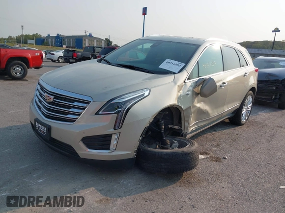 2017 Cadillac XT5 Premium Luxury FWD z VIN 1GYKNCRSXHZ164468, wystawiony jako IAAI lot #40314503 z przebiegiem 94 008 mil mil oraz . Historia ofert i sprzedaży dostępna na DreamBid. Obrazek 17.