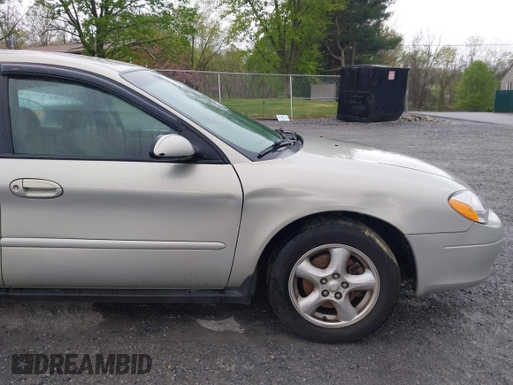 2003 Ford Taurus SES Standard with VIN 1FAFP55U43A140202, listed as a IAAI auction lot 41994960 with 90,650 mi miles. Bid and sale history available at carsss.com. Image 13.