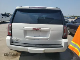 2020 GMC Yukon SLT with VIN 1GKS1BKC0LR243224, listed as a Copart auction lot 65768234 with 129,702 mi miles and Salvage Title. Bid and sale history available at DreamBid. Image 6.