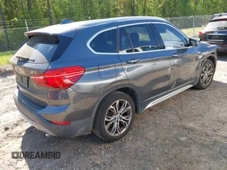 2017 BMW X1 xDrive28i with VIN WBXHT3C31H5F80056, listed as a IAAI auction lot 42049925 with 64,471 mi miles and . Bid and sale history available at DreamBid. Image 4.