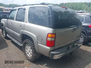 2003 Chevrolet Tahoe LT with VIN 1GNEC13Z73R247245, listed as a IAAI auction lot 42001442 with 263,939 mi miles. Bid and sale history available at carsss.com. Image 3.