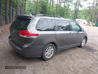 2011 Toyota Sienna XLE AAS with VIN 5TDYK3DC8BS016319, listed as a IAAI auction lot 42186294 with 293,401 mi miles and . Bid and sale history available at DreamBid. Image 4.
