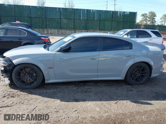 2022 Dodge Charger Scat Pack Widebody with VIN 2C3CDXGJ6NH176650, listed as a IAAI auction lot 41863122 with 34,569 mi miles and . Bid and sale history available at DreamBid. Image 14.