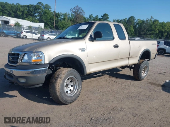 2000 Ford F-150 XL z VIN 1FTRX18W7YNA73804, wystawiony jako IAAI lot #42779753 z przebiegiem 228 666 mil mil oraz . Historia ofert i sprzedaży dostępna na DreamBid. Obrazek 2.