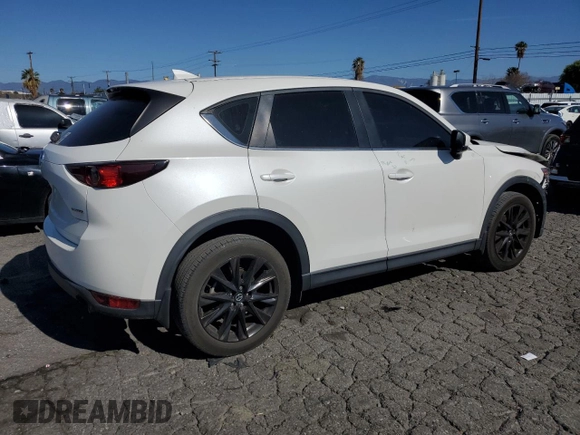 2021 Mazda CX-5 Sport with VIN JM3KFABM4M1321480, listed as a Copart auction lot 46187805 with 66,382 mi miles and Salvage Title. Bid and sale history available at carsss.com. Image 3.