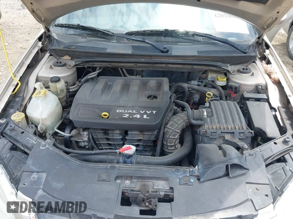 2013 Chrysler 200 LX with VIN 1C3CCBAB2DN733471, listed as a IAAI auction lot 42016020 with 182,681 mi miles and . Bid and sale history available at DreamBid. Image 10.