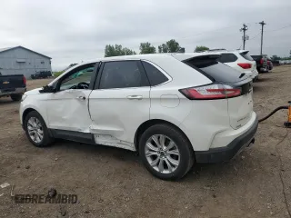 2021 Ford Edge Titanium with VIN 2FMPK4K90MBA34404, listed as a Copart auction lot 61762715 with 45,102 mi miles and Salvage title. Bid and sale history available at DreamBid. Image 2.