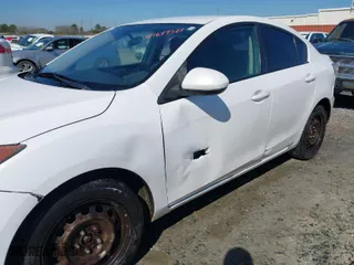 2011 Mazda Mazda3 i Sport with VIN JM1BL1UF9B1417411, listed as a IAAI auction lot 41649521 with 233,938 mi miles. Bid and sale history available at carsss.com. Image 6.